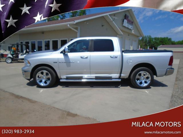 Silver 2011 Ram  Laramie 4x4 4dr Crew Cab 5.5 ft. SB Pickup, Image 0