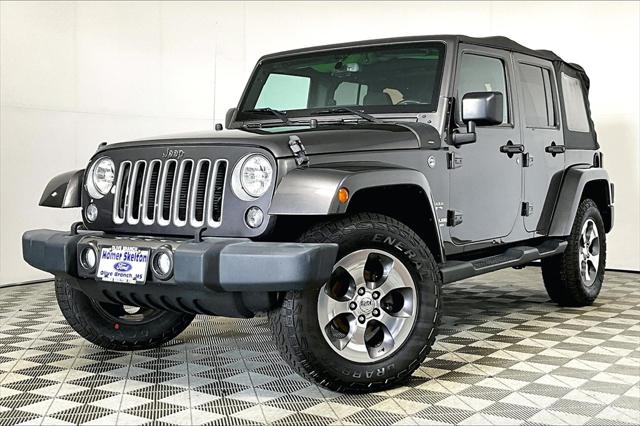 Used 2016 Jeep Wrangler Unlimited Sahara with VIN 1C4BJWEG0GL164419 for sale in Olive Branch, MS