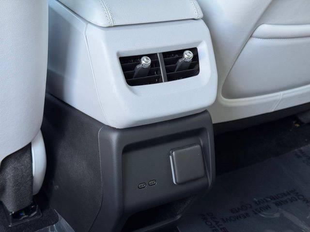 2025 Cadillac iQ Sport