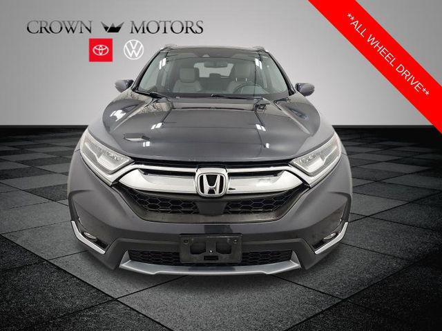 Used 2017 Honda CR-V Touring with VIN 5J6RW2H93HL073310 for sale in Holland, MI