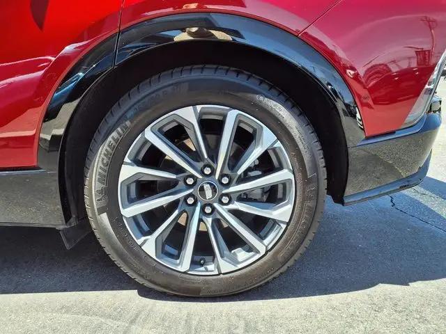 2024 Cadillac iQ Sport w/1SJ