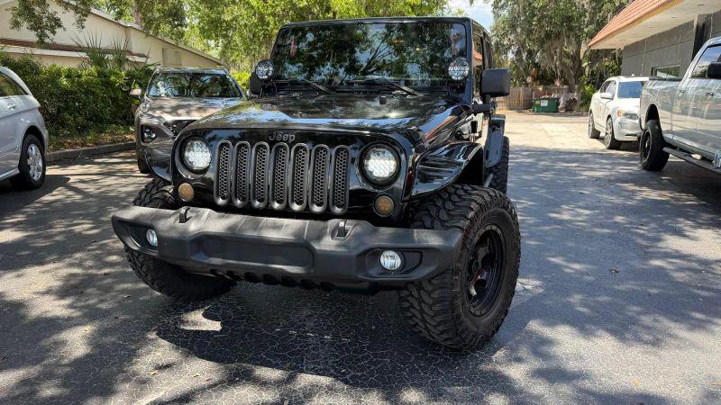 2013 Jeep Wrangler Unlimited Sport for sale in Tavares, FL