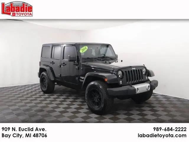 2014 Jeep Wrangler Unlimited Sahara for sale in Bay City, MI