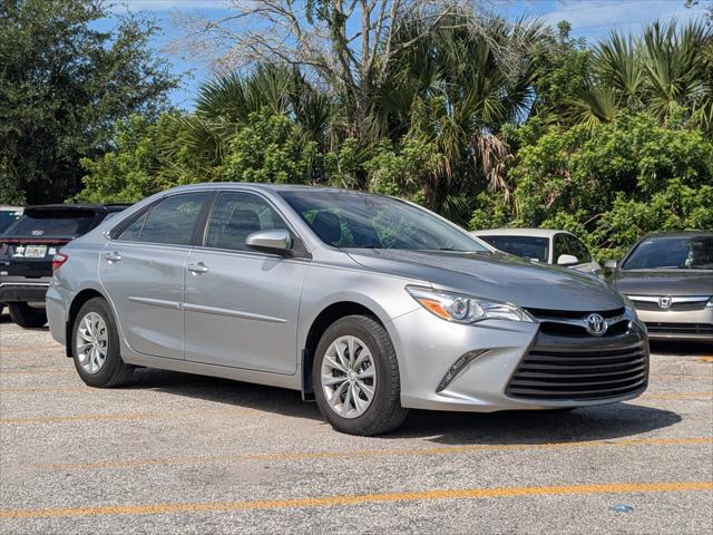 2015 Toyota Camry LE for sale in ORLANDO, FL