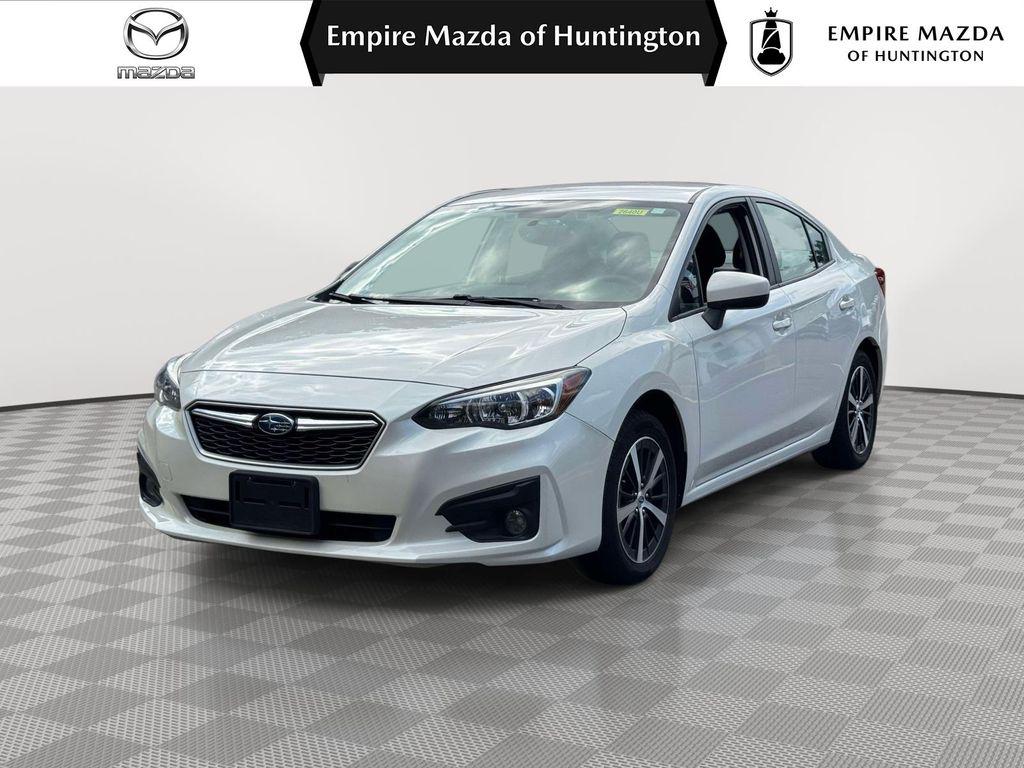 Crystal White Pearl 2019 Subaru Impreza Sedan All-Wheel Drive Continuously Variable Transmission