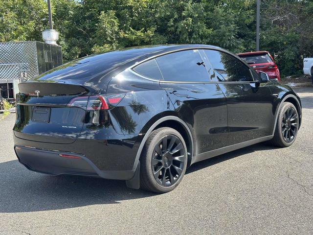 Used 2024 Tesla Model Y Long Range with VIN 7SAYGDEE7RA243877 for sale in Chantilly, VA