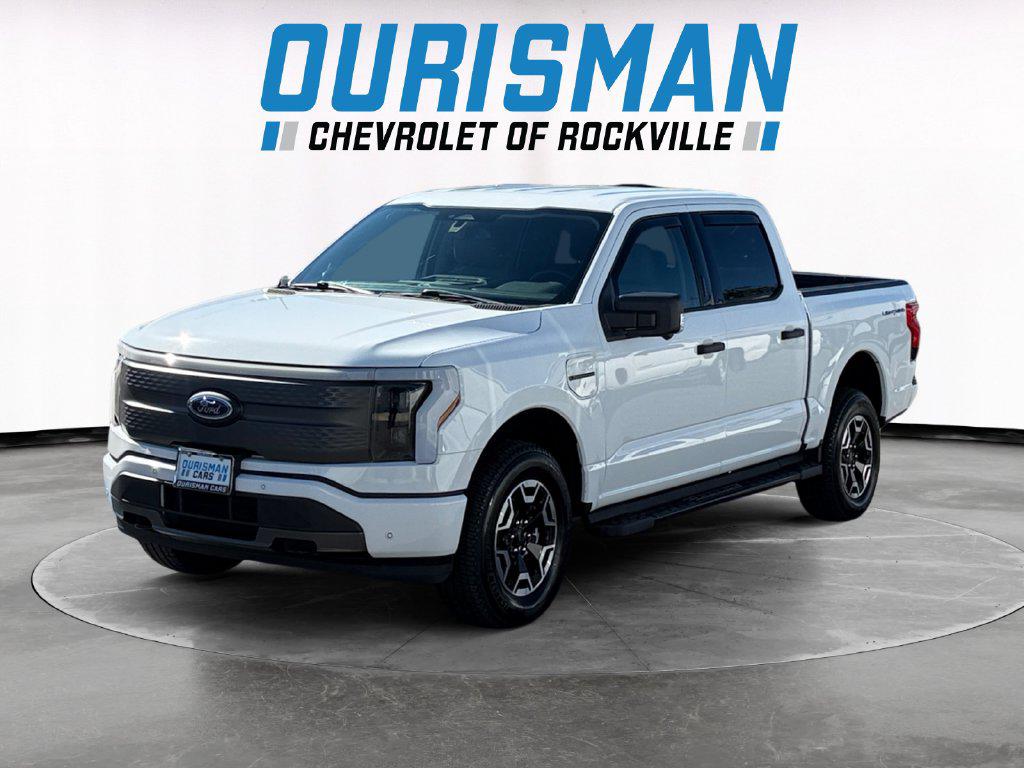 Used 2022 Ford F-150 Lightning XLT with VIN 1FTVW1EL0NWG16606 for sale in Rockville, MD